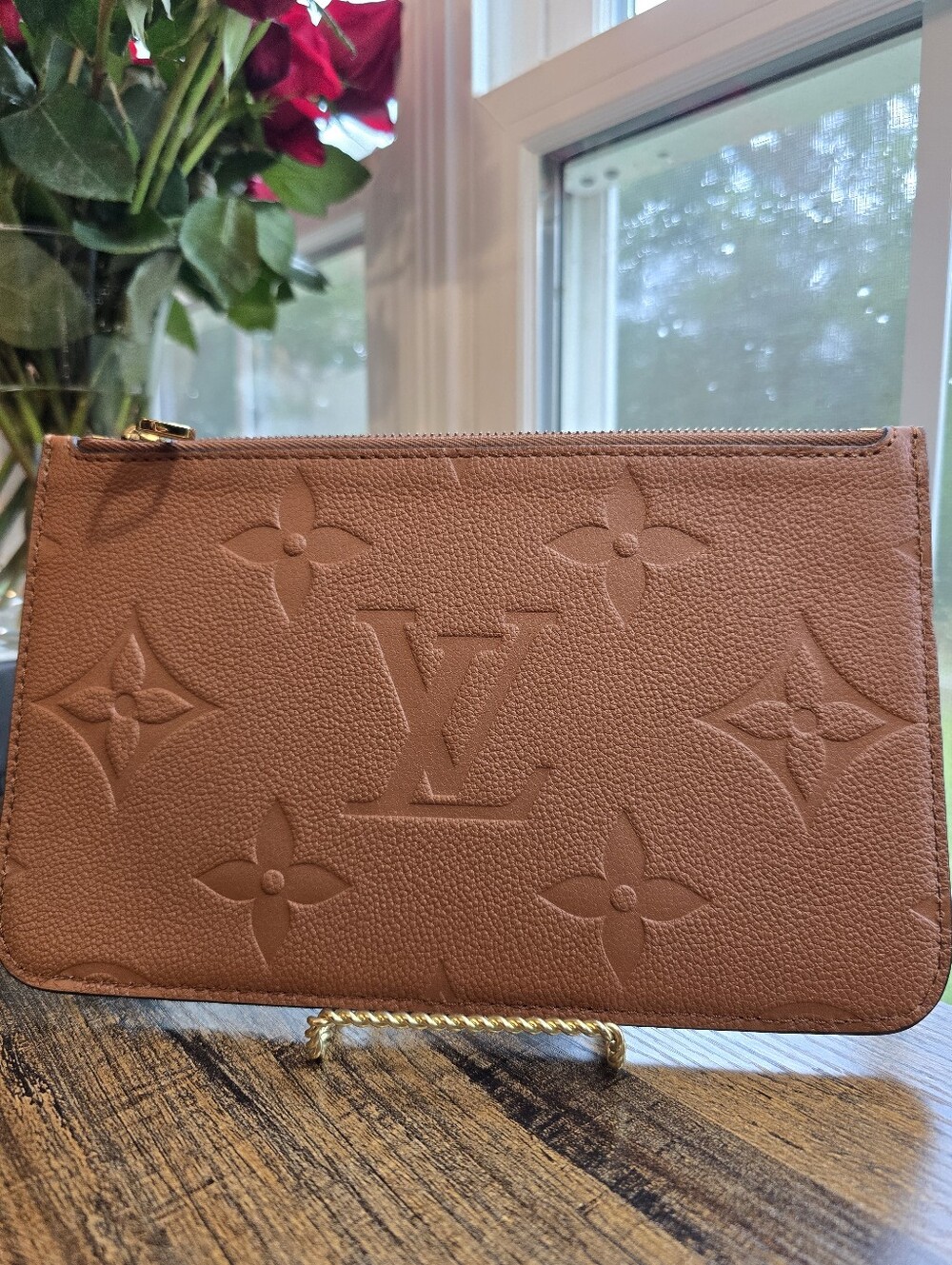 Louis Vuitton Neverfull Pochette Giant Monogram Empreinte Leather in Brown